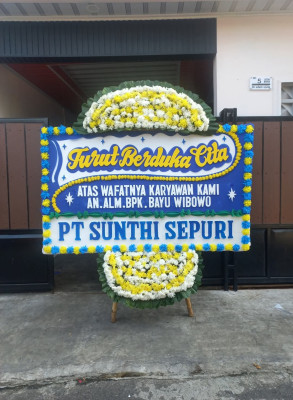 Papan Bunga Duka di Berandan Barat