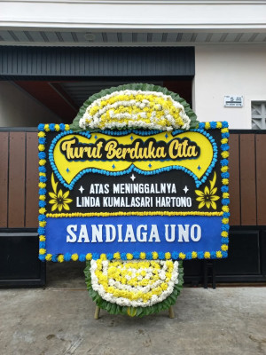 Papan Bunga Duka di Berandan Barat